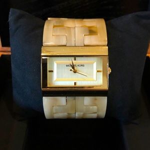 Authentic Michael Kors timepiece.